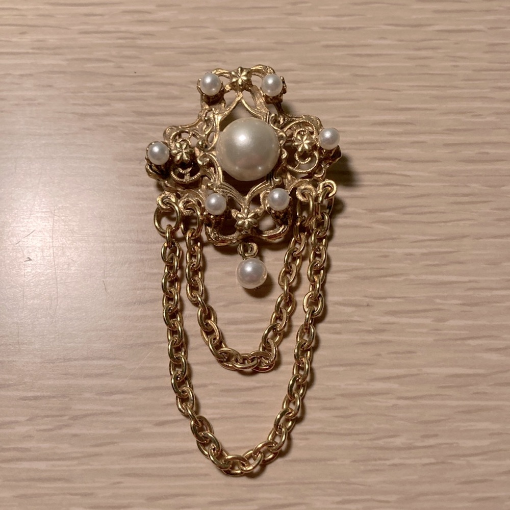Brooch with pearl beading and hanging chain